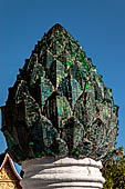 Wat Xieng Thong temple in Luang Prabang, Laos. Lotus buds decorated with coloured mirrors 